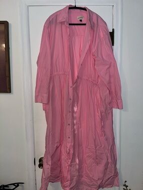 Long pink dress with sleeves and pockets